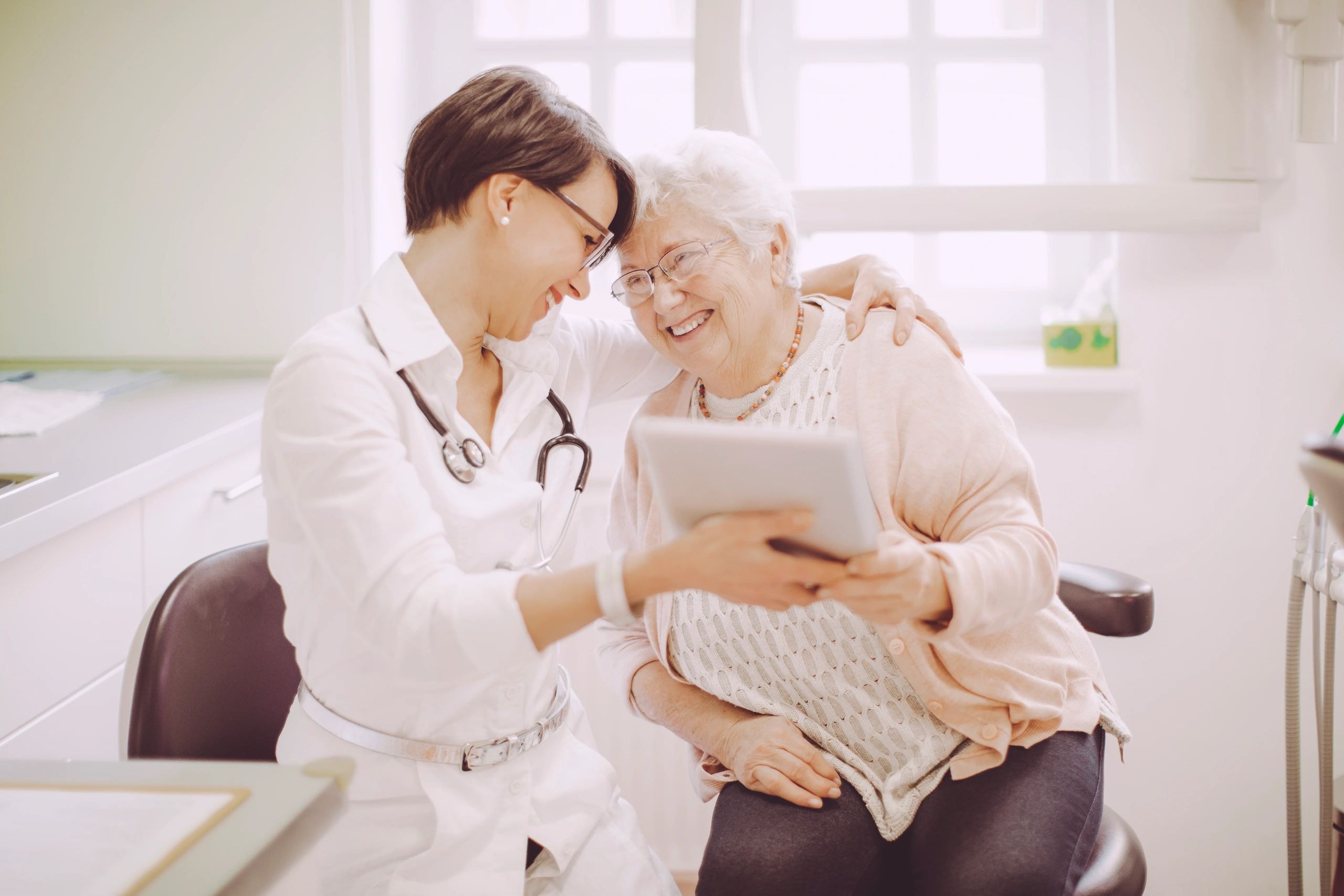 Doctor and patient reviewing care plan together